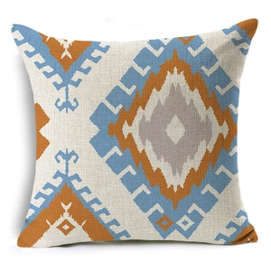 Close-up of geometric linen pillowcase with bohemian pattern and textured fabric detail
