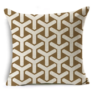 Macro shot of geometric textured linen cushion cover with brown Y-pattern design