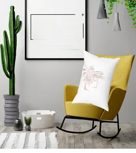 Floral alphabet letter F design on peach skin long pillowcase on a yellow chair