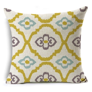 Close-up of geometric Ikat pattern on linen blend square pillowcase with visible texture