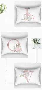 Detailed view of floral peach skin long pillowcase with elegant pink alphabet print
