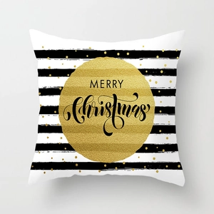 Λεπτομέρεια χρυσού Merry Christmas σε ριγέ μαξιλαροθήκη με χρυσή υφή από γκλίτερ