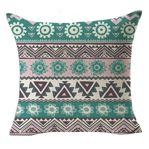 Bohemian geometric linen pillow cover with ethnic sun patterns and teal floral accents