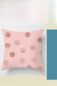 Detail of pink marble plush pillowcase with metallic rose gold polka dots pattern