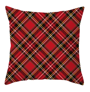 Close-up of classic red tartan plaid pattern and canvas texture on square pillowcase