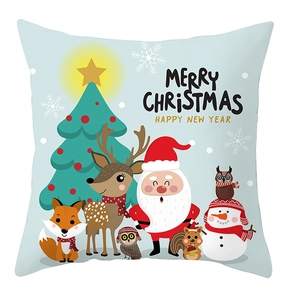 Detail of Christmas pillow cover with cartoon reindeer and Santa claus pattern