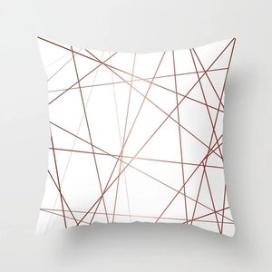 Modern square throw pillow cover with rose gold geometric lines on white fabric