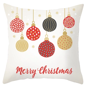 Detail of Christmas reindeer pillowcase with festive red and gold snowflake patterns
