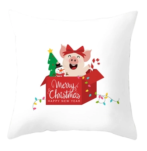 Detail of cartoon pink pig in red gift box with Merry Christmas print on pillowcase