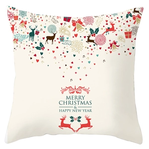 Detailed close-up of Christmas reindeer and snowflake patterns on a white pillowcase