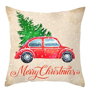 Close-up of linen fabric texture on Christmas pillowcase with red car and tree design