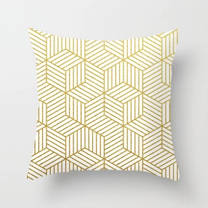 Detail of white peach skin pillowcase with golden 3D geometric cube glitter patterns