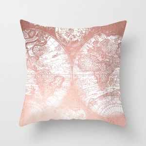 Square pink pillow cover with rose gold world map print on a soft white fabric base