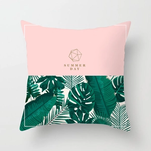 Nordic square pillow cover with pink top, golden Summer Day text and tropical leaf patterns