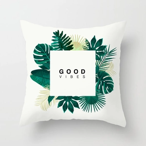 Nordic style white cushion cover with tropical green leaves and GOOD VIBES text print