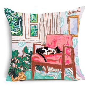Detailed view of linen cushion cover featuring oil painting style cat on pink armchair