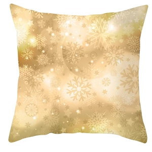 Detail of golden snowflake and star patterns on champagne peach skin pillowcase