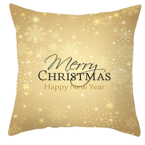 Detail of champagne gold peach skin pillowcase with white snowflakes and festive text