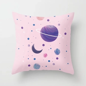 Detail of pink peach skin pillowcase featuring dreamy hand-painted space planet patterns