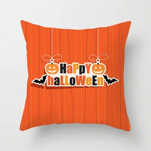 Detail of Happy Halloween peach skin pillowcase with orange pumpkin and bat design