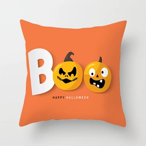 Detail of orange Boo Halloween pillowcase with pumpkin graphics and happy halloween text
