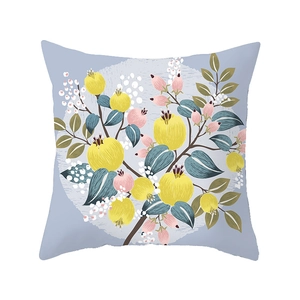 Pastel floral throw pillow cover featuring yellow fruit and pink buds on light blue