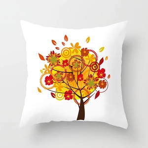 Detailed close-up of a square pillowcase featuring a colorful artistic autumn tree pattern