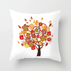 Detail of a white throw pillow featuring colorful abstract floral tree art pattern