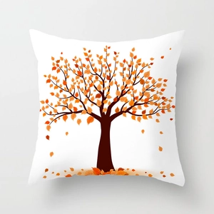 Close-up of white square pillowcase with autumn tree leaf print and fine stitching