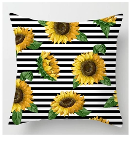 Close-up of sunflower print on black and white striped cushion cover fabric texture