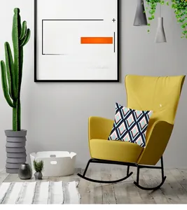Detail of geometric pattern pillowcase on yellow rocking chair in modern living room