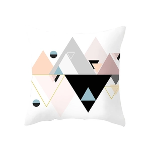 Modern geometric pillow cover with pink and gold accents on a clean white background