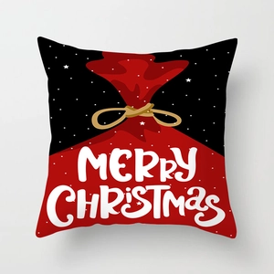 Detail of Merry Christmas pillowcase featuring red gift bag silhouette and stars