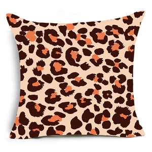 Classic animal print leopard throw pillow cover with brown and orange spots on beige