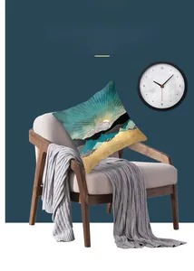 Detail of modern mountain landscape cushion cover on a chair with deep blue background
