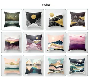 Grid display of 12 modern mountain and nature art prints on square cushion covers