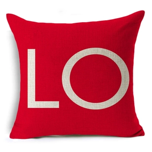 Close-up of red linen pillowcase showing high-quality fabric texture and white LO print