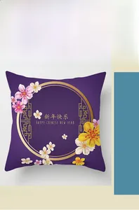 Detail of square purple festive cushion cover with golden frames and floral pattern