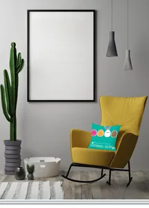 Detailed close-up of a blue Easter bunny cushion cover placed on a yellow rocking chair