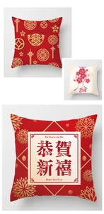 Close-up detail of Chinese New Year pillow covers with festive red embroidery and patterns