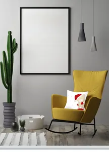 Detail of cartoon bear print on white canvas cushion cover on a yellow rocking chair