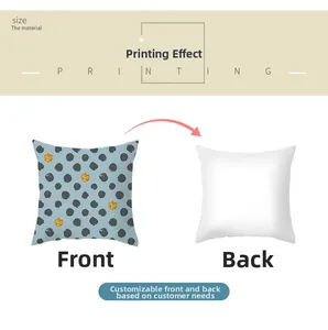 Detail of blue geometric cushion cover with grey and gold dots and plain white back