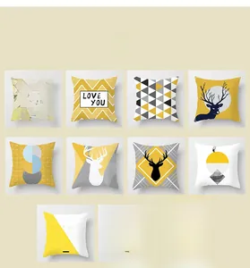 Detailed grid showing eleven Nordic style cushion covers with yellow geometric deer patterns