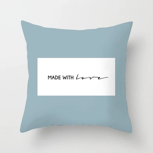 Nordic geometric throw pillow cover in dusty blue with MADE WITH LOVE print design