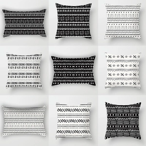 Housses de coussin géométriques marocaines noir et blanc aux motifs tribaux