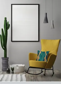 Close-up of modern dark green pillowcase with gold wave patterns on a yellow chair