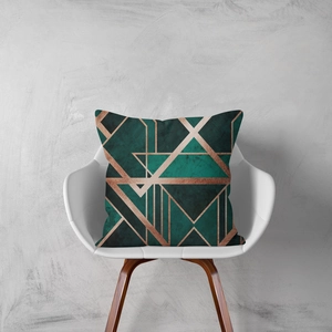 Modern Nordic teal and rose gold geometric cushion cover on a white armchair