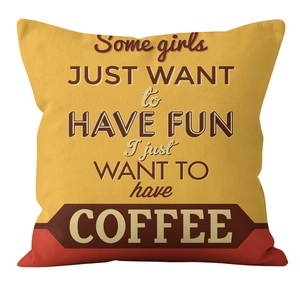 Detailed macro shot of yellow linen pillow case featuring American coffee quote design