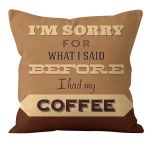 Detail of linen coffee pillow cover showing textured fabric and funny quote print