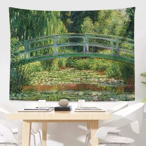 Artistic Monet Water Lilies wall tapestry hanging above a modern dining set in a white room